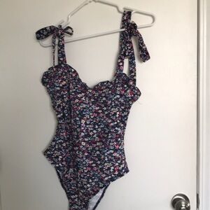 XS body suit. New without tags